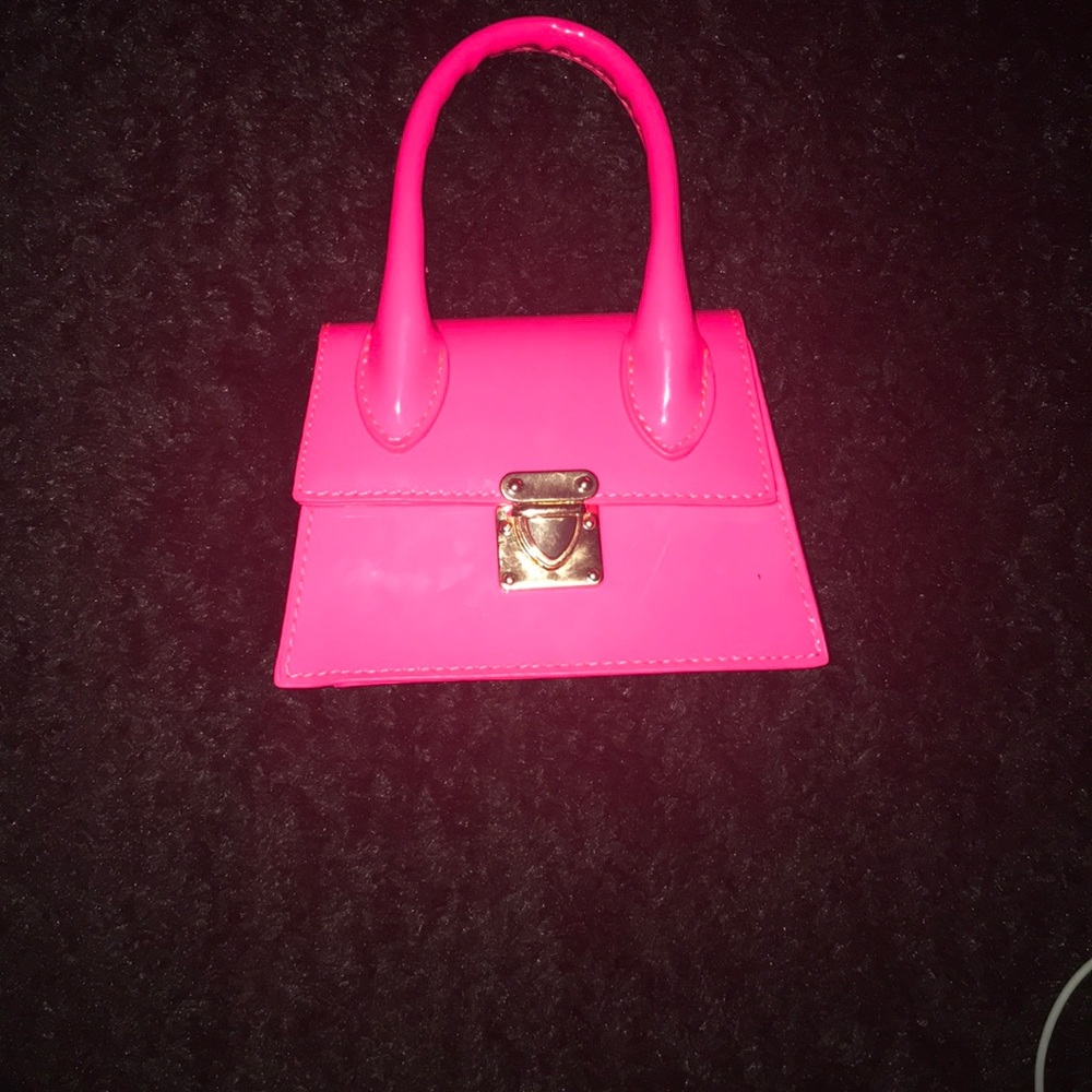 A pink mini purse